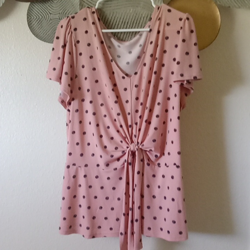 Pink and black polka-dot blouse